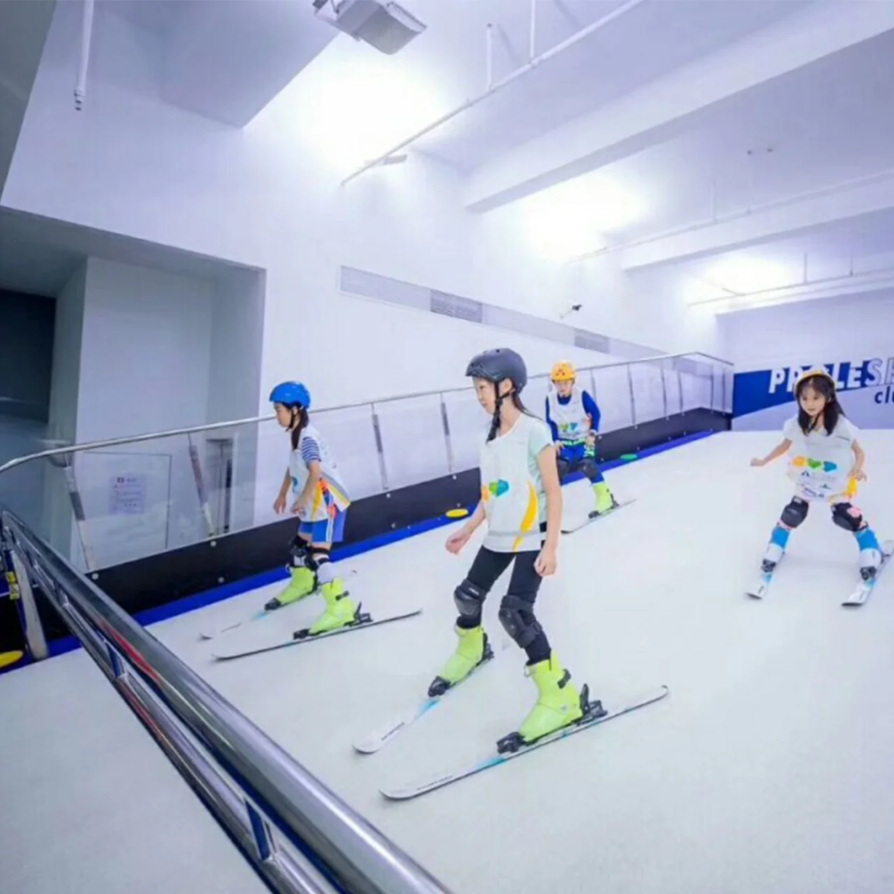 Three skiers practising together on a PROLESKI ski simulator