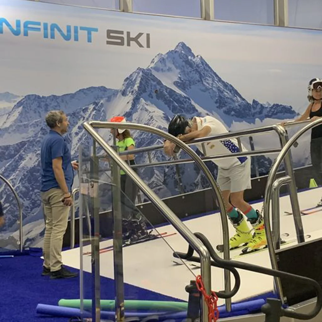 Ski equipment beside a PROLESKI indoor slope at Infinit Ski
